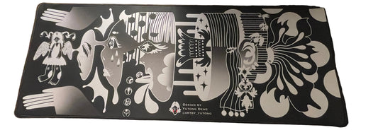 Desk setup with a decorative mouse pad featuring artistic designs.