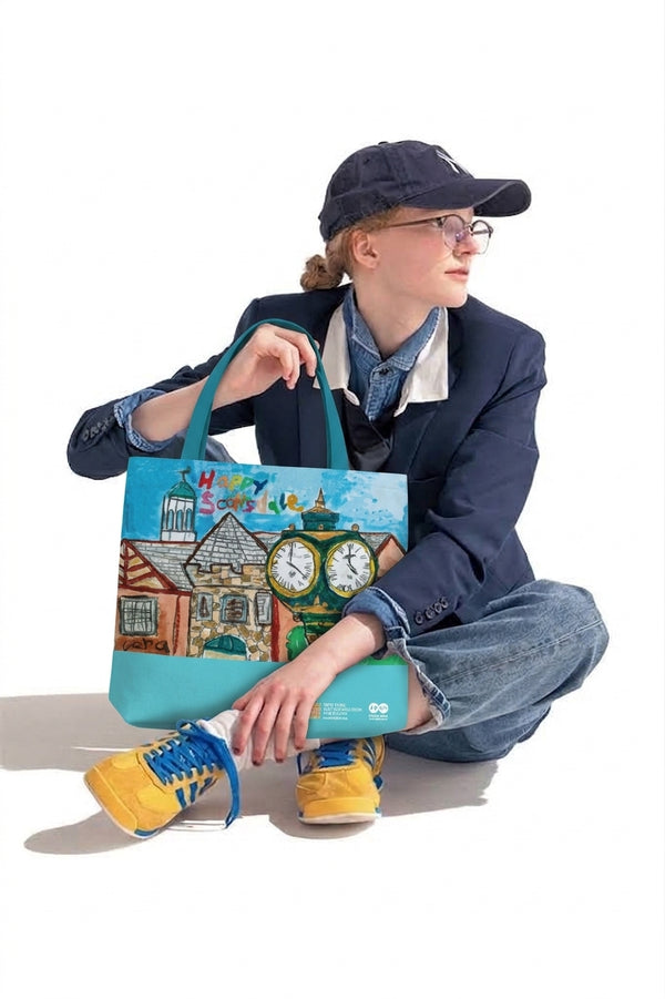 Vera Zeng Happy Scarsdale tote bag held by a model