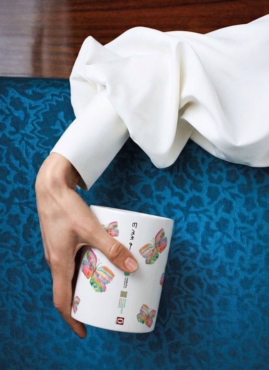 Emma butterfly mug, held